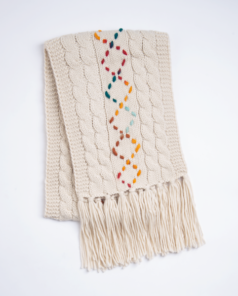 Cream cable knit fringe scarf with colorful diamond stitching