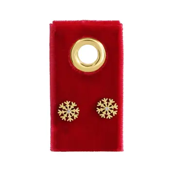 Gold Snowflake Studs On Velvet Tag