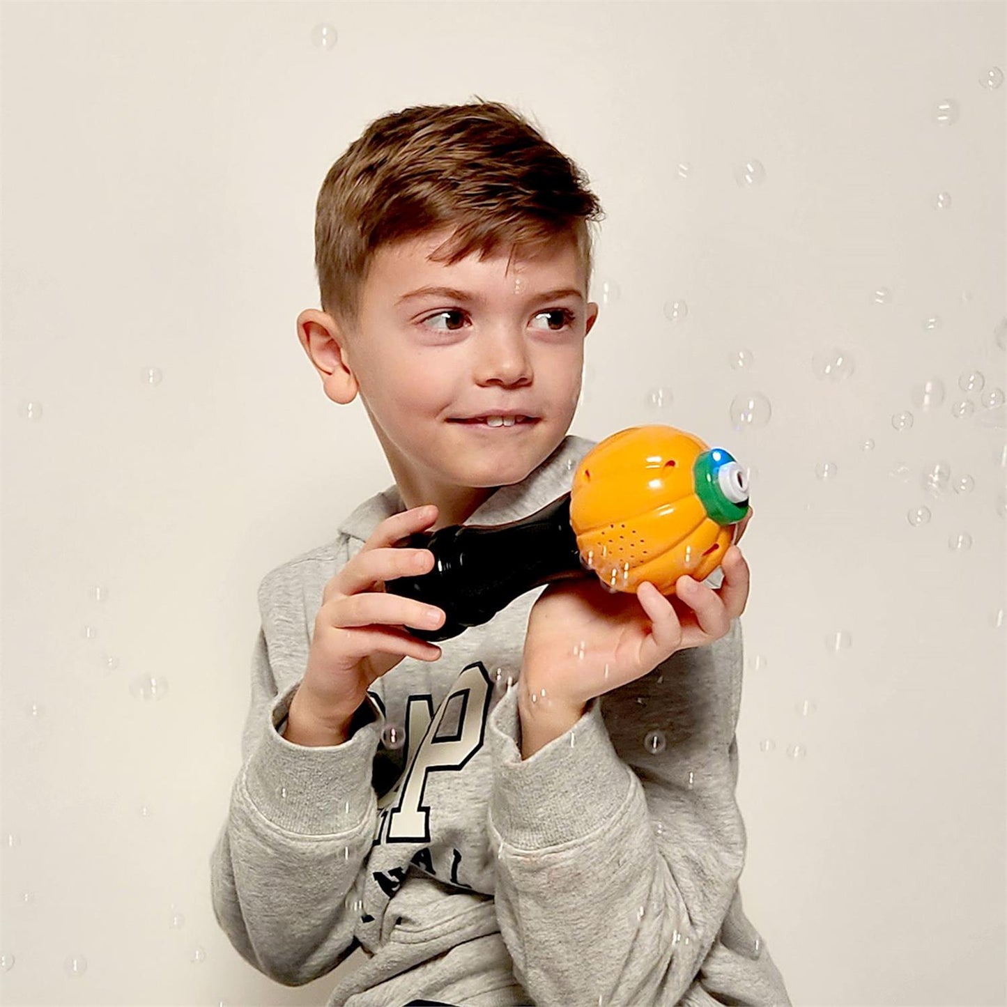 Jack-o-Lantern Illuminating Bubble Wand Blower with Refillable Bottle and Solution