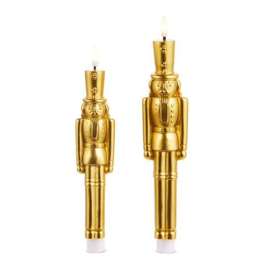 Set of 2 gold nutcracker LED taper candles, 11.5 and 9.75 inch