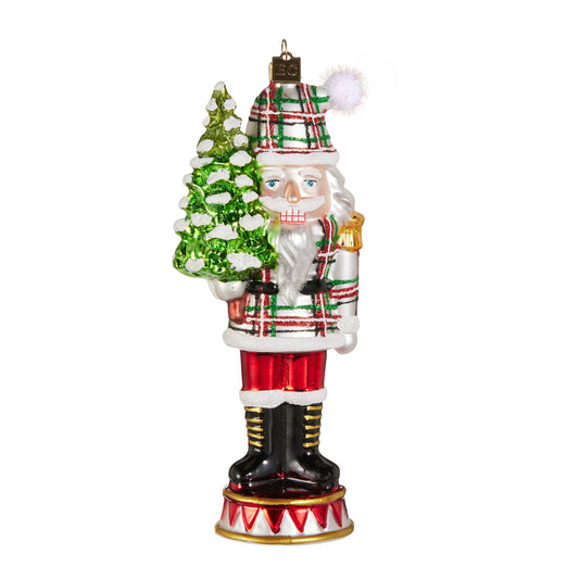 7 inch plaid nutcracker glass Christmas ornament holding a snowy tree