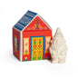 The Gnome's Cottage Soap - gnome-shaped white bar soap beside its illustrated red and blue Nordic folk art cottage box