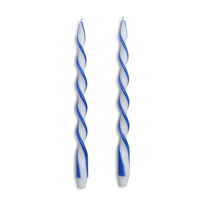 Two blue ribbon twist taper candles