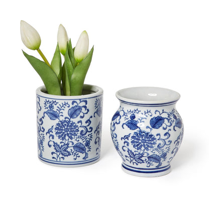Two blue and white chinoiserie small vases, straight and rounded, one holding white tulips
