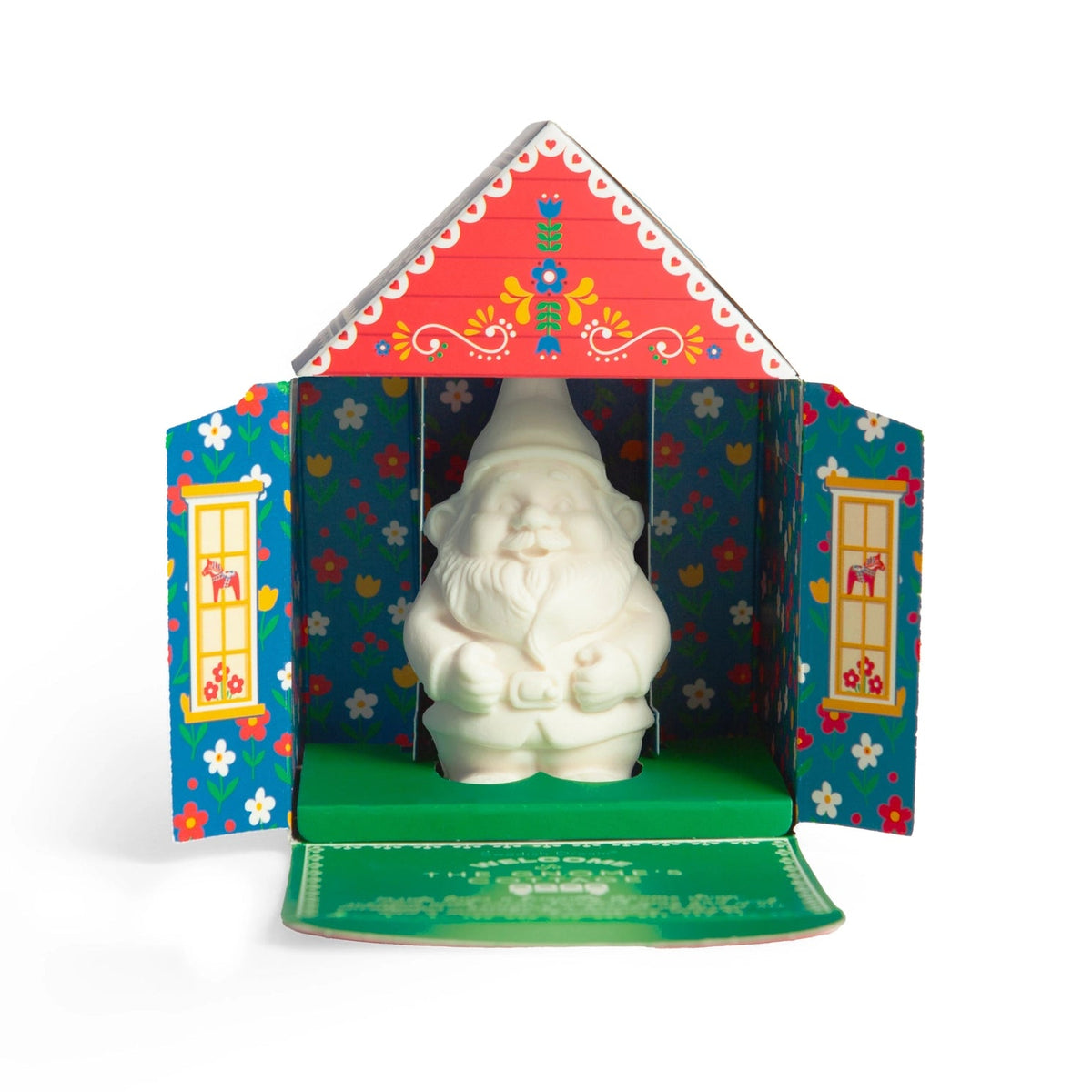 Nordic cottage box opened to show the gnome-shaped soap standing inside, with Dala horse and floral folk art on the panels