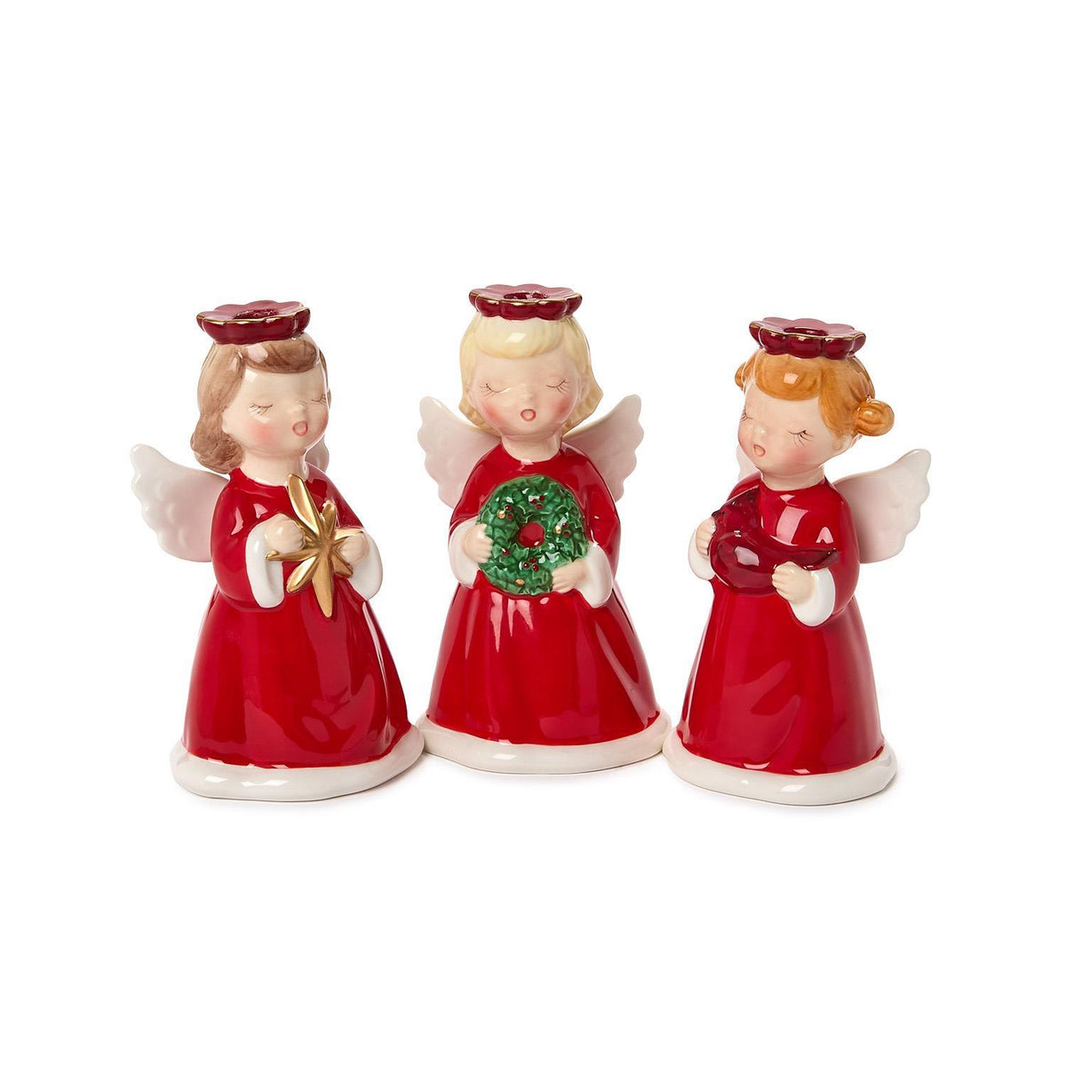 Three hand-painted red Christmas angel candleholders holding a star, wreath and cardinal