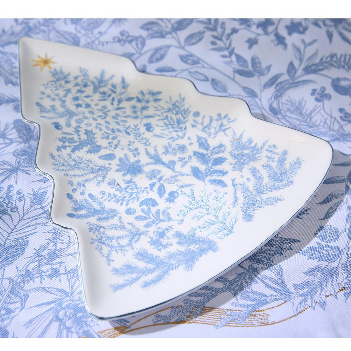 Gilded Cottage blue and white Christmas tree plate styled for the holidays