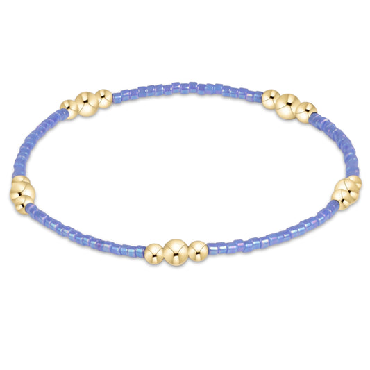 enewton Hope Purpose Gold Bracelet - Bright Blue shown flat on a plain white background