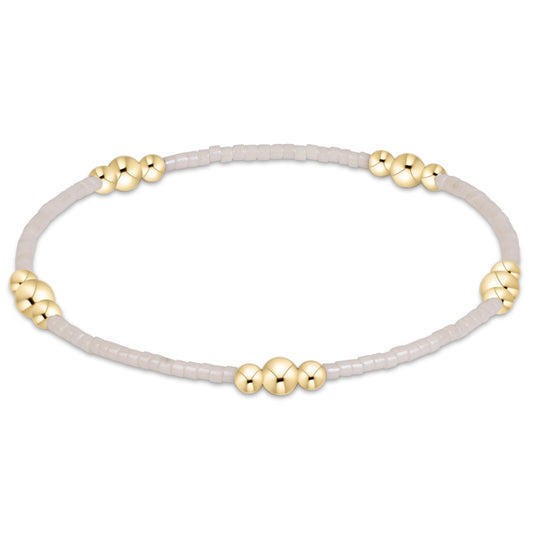 enewton Hope Purpose Gold Bracelet - Milkshake shown flat on a plain white background
