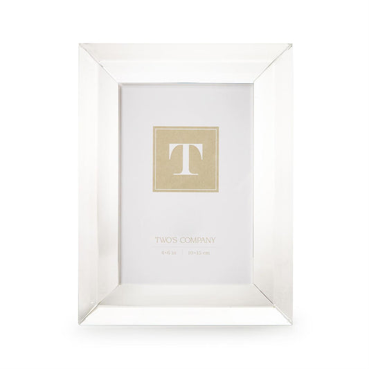 Modern cut clear crystal 4x6 picture frame with a wide beveled border, standing upright