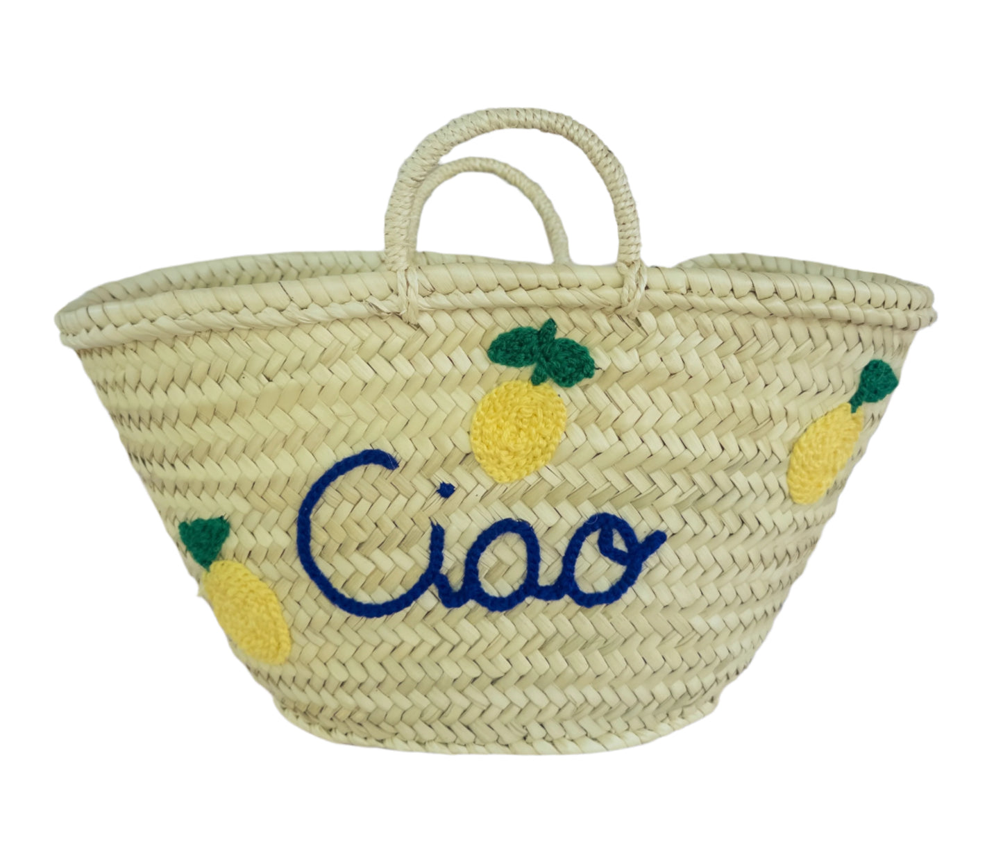 Woven bag with 'Ciao' and lemon designs on a white surface