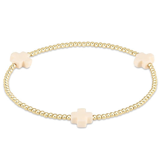 enewton Signature Cross 2mm Gold Beaded Bracelet in Off-White shown flat on a plain white background