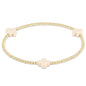 enewton Signature Cross 2mm Gold Beaded Bracelet in Off-White shown flat on a plain white background