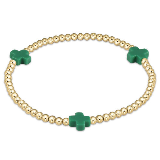 enewton Signature Cross 3mm Gold Beaded Bracelet in Emerald shown flat on a plain white background