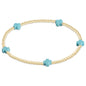 enewton Signature Cross Small 2mm Gold Bracelet in Turquoise shown flat on a plain white background