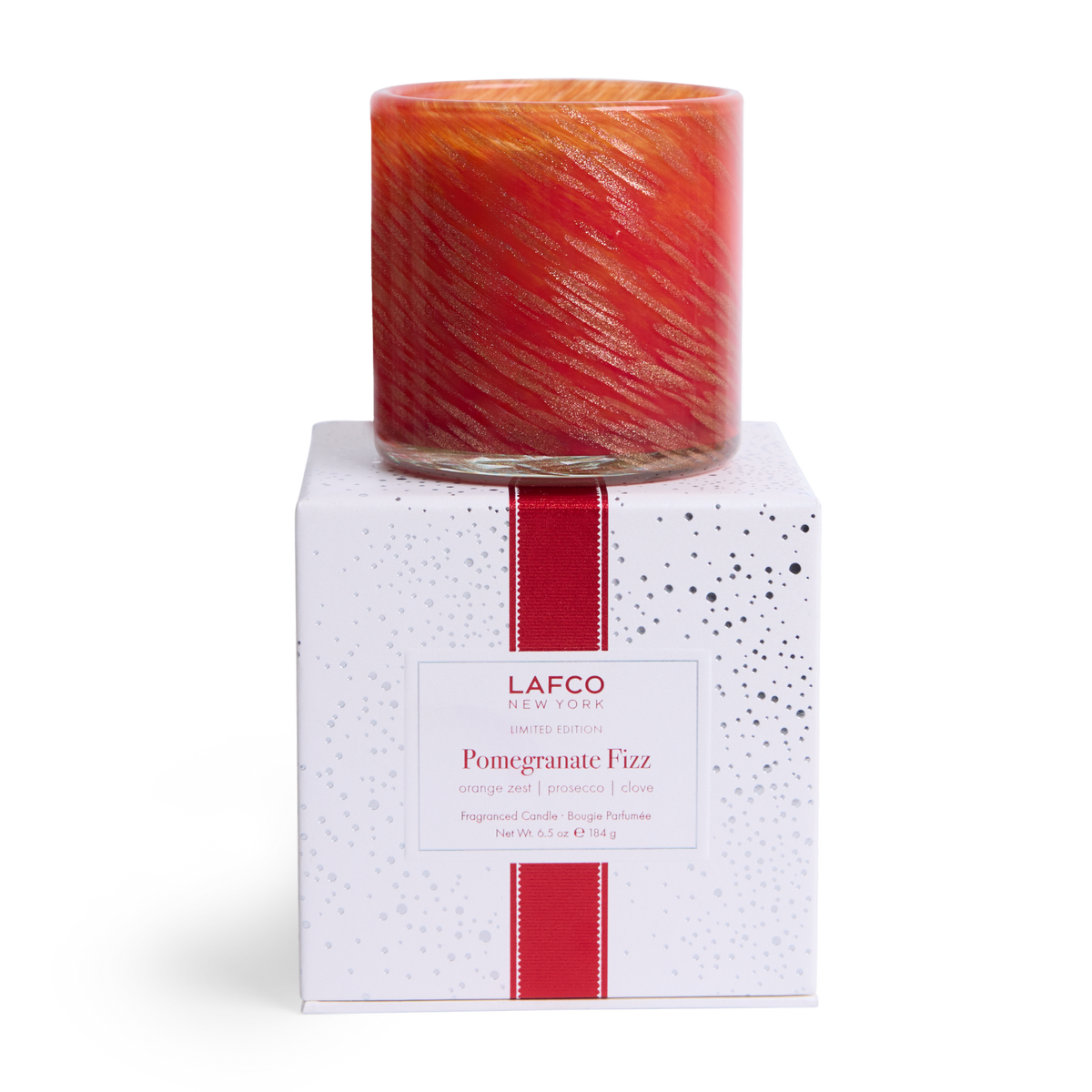 LAFCO Pomegranate Fizz Classic Candle 6.5 oz - red and orange hand-blown glass vessel on its white LAFCO gift box