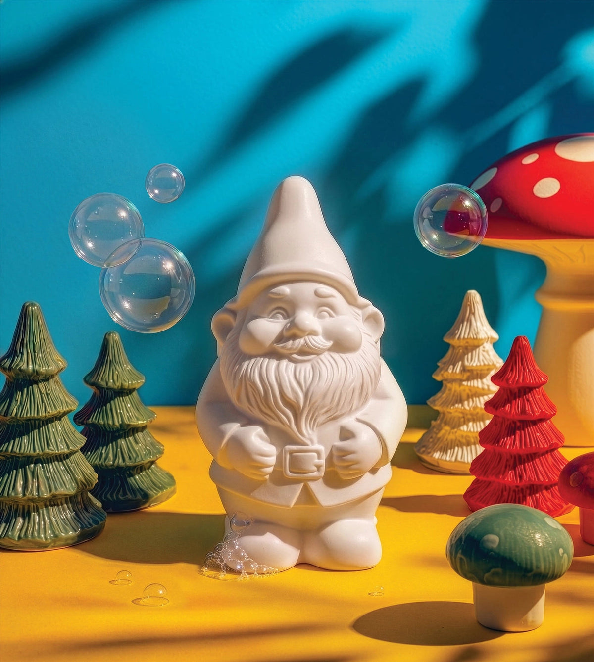 Close-up of the gnome-shaped Swedish Pine soap with soap bubbles and paper trees