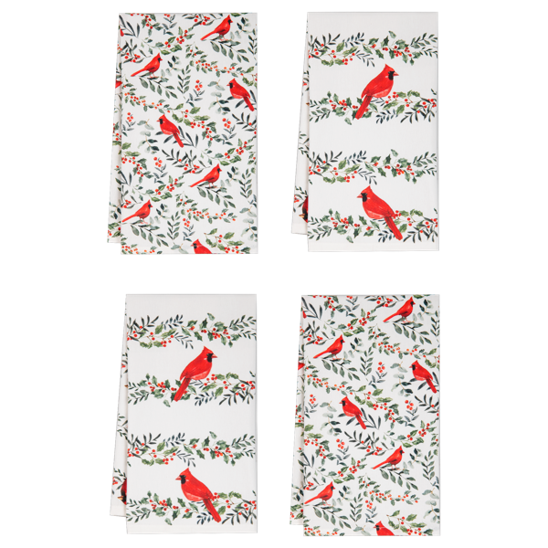 White cotton tea towels printed with red cardinals perched among berry branches