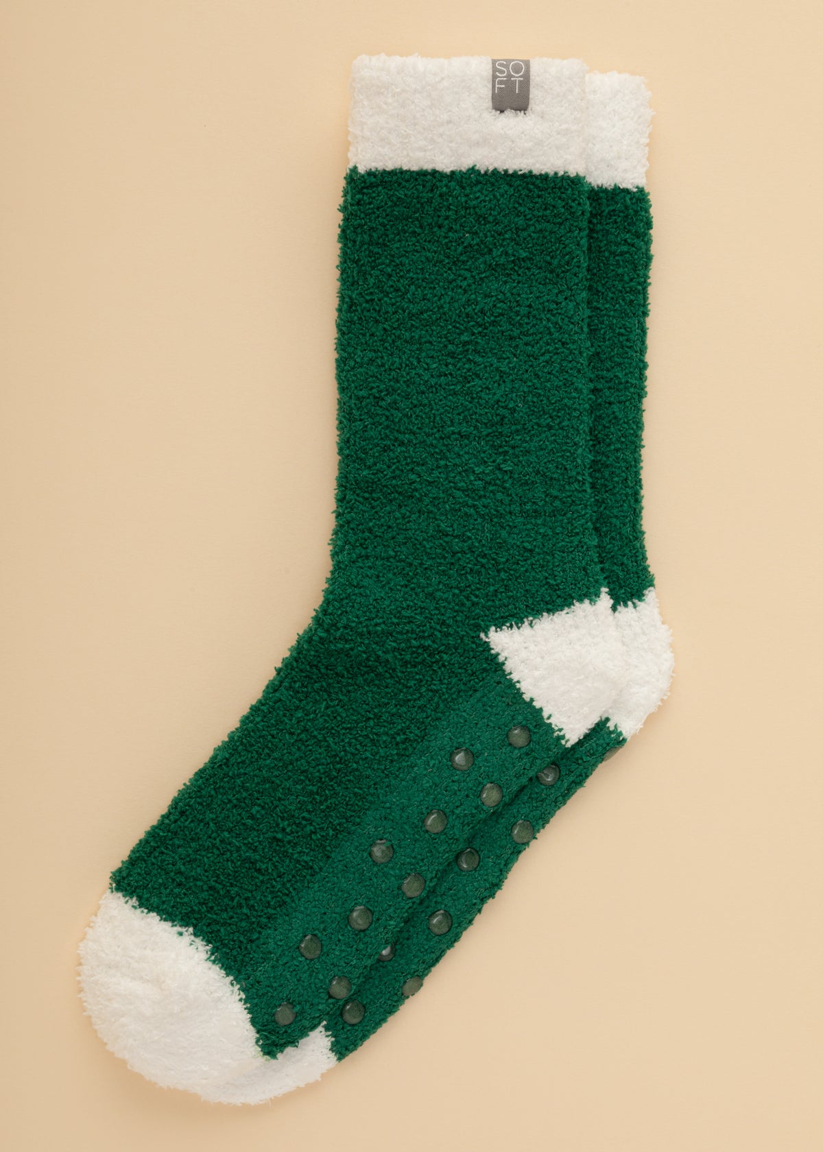 Softies Marshmallow crew socks in green with white heel, showing gripper soles