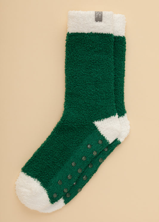 Softies Marshmallow crew socks in green with white heel, showing gripper soles