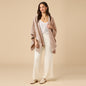 Woman wearing Softies Solid Rib Marshmallow Shawl in Coco