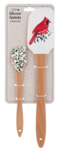 Spatula printed with a red cardinal on a branch beside a holly spoonula