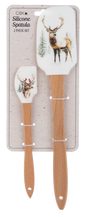 Spatula printed with an antlered stag paired with a small winter scene spoonula