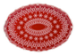 Oval red platter covered in raised white snowflake lacework with a scalloped edge