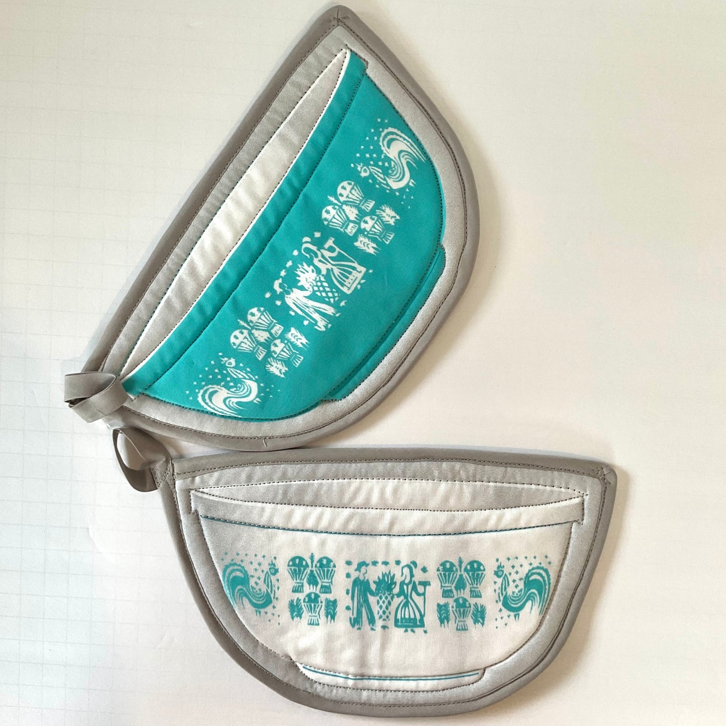 Pair of Pyrex Turquoise Butterprint Bowl Shaped Potholders