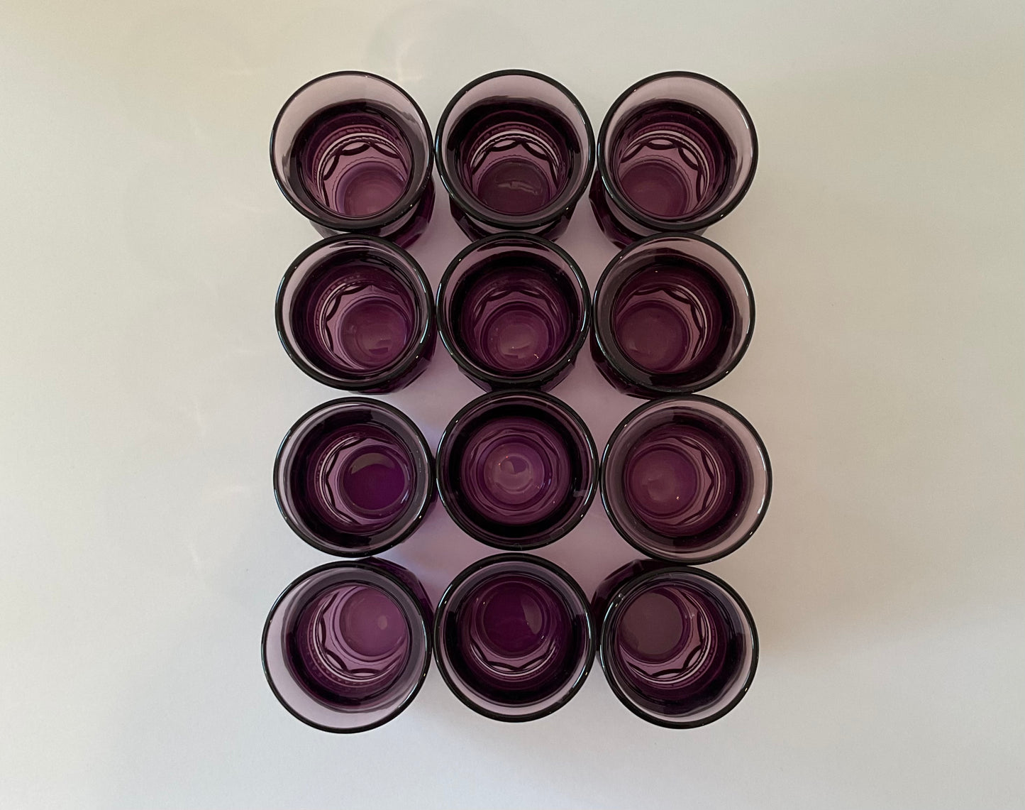 Set of 12 1960's Amethyst Kings Crown Glass Thumbprint Juice glasses