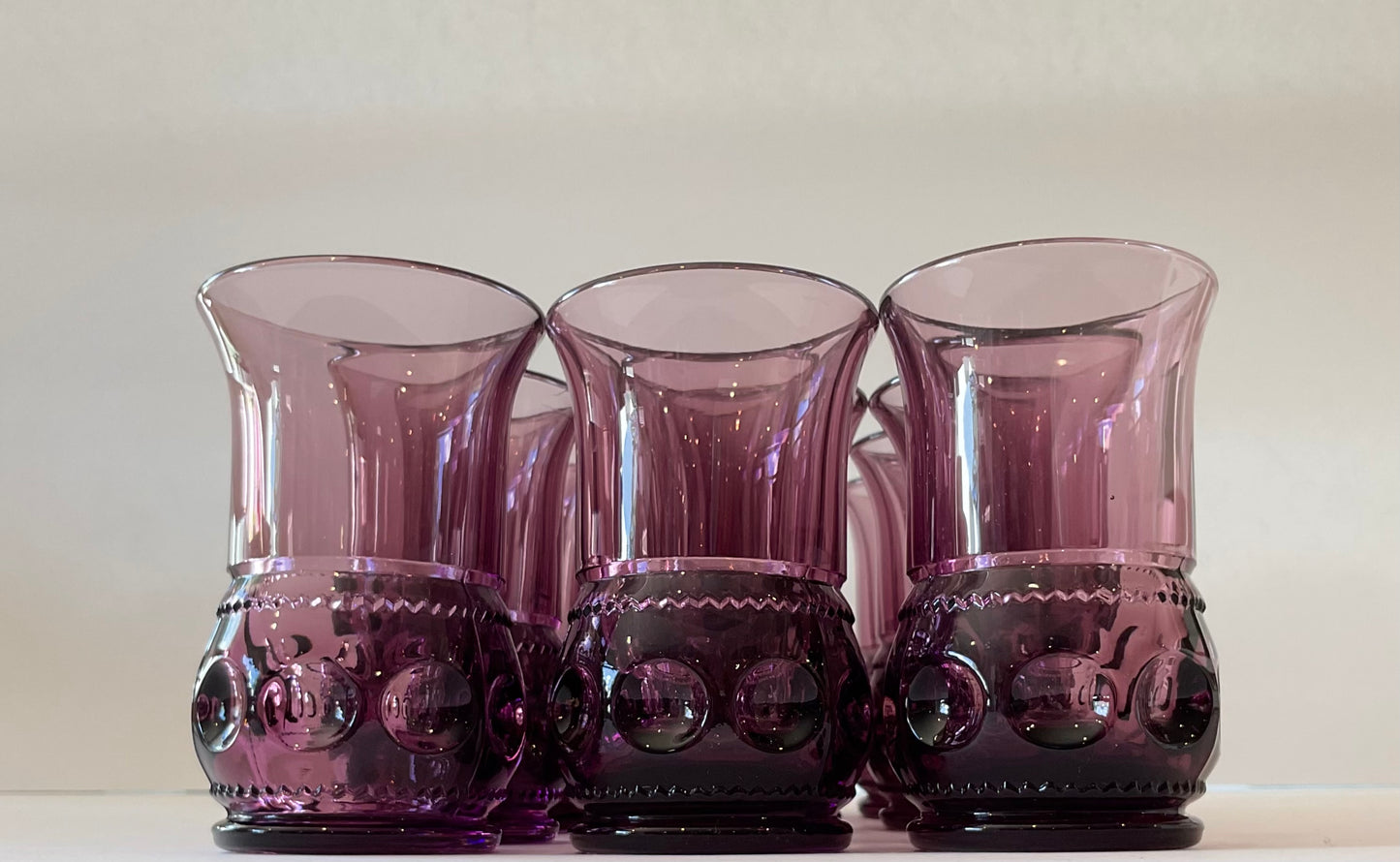 Set of 12 1960's Amethyst Kings Crown Glass Thumbprint Juice glasses